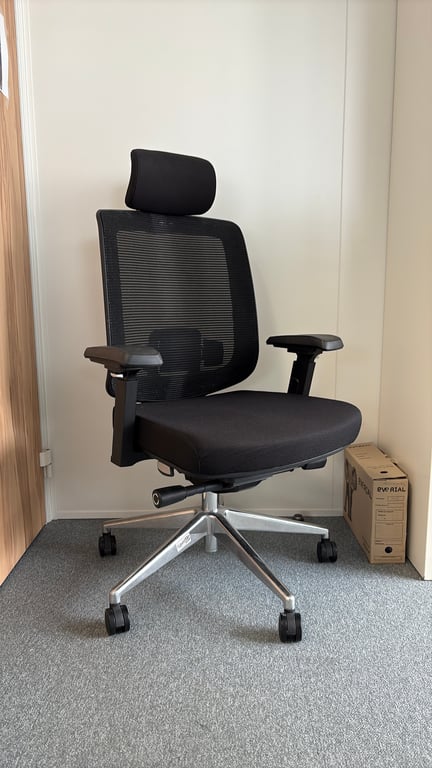 Fauteuil de bureau avec têtière et roulettes