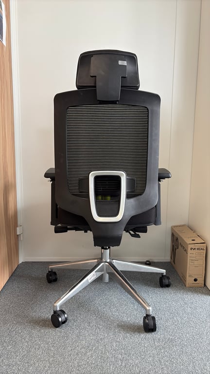Fauteuil de bureau avec têtière et roulettes
